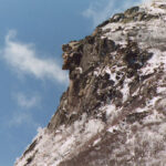 Photograph of the Old Man of the Mountain atop Cannon Mountain in the winter time